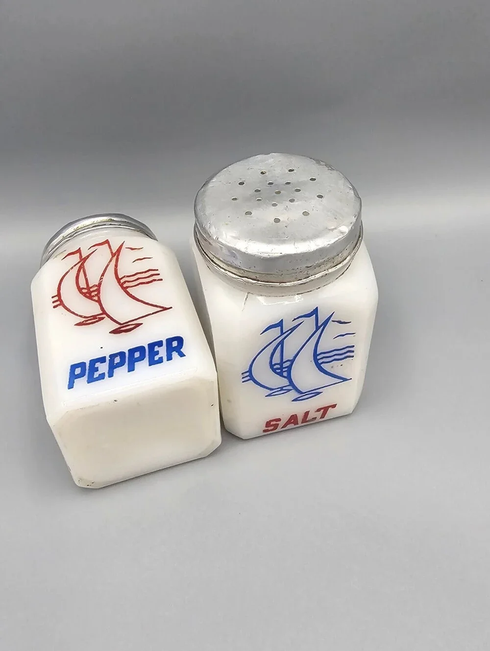 Vintage Milk Glass Salt and Pepper Shakers with Sailboat Design